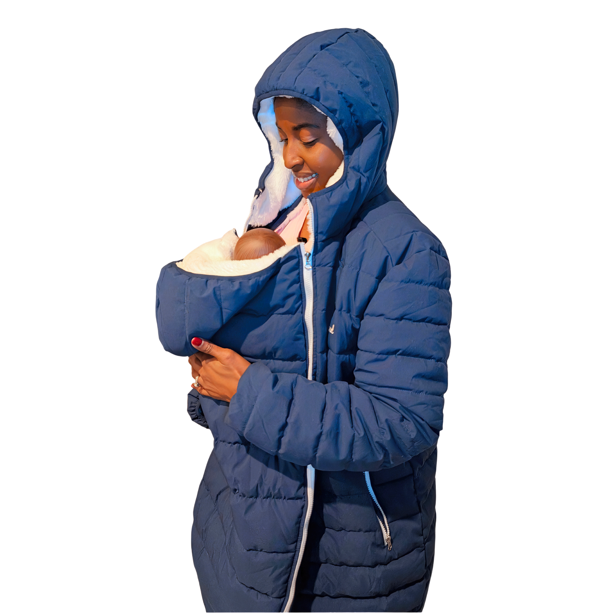Person wearing a blue puffer coat holding a baby in a baby carrier, underneath Cuddlebond's baby carrier overwear.